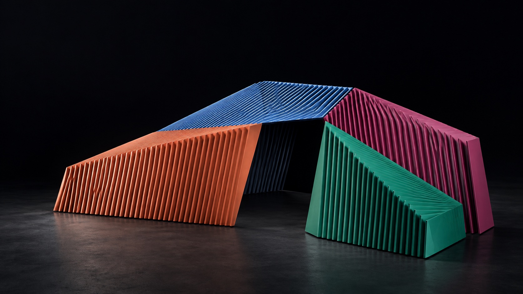 Four folded panels of coral, blue, magenta and jade lamellae form an asymmetric architectural pavilion.